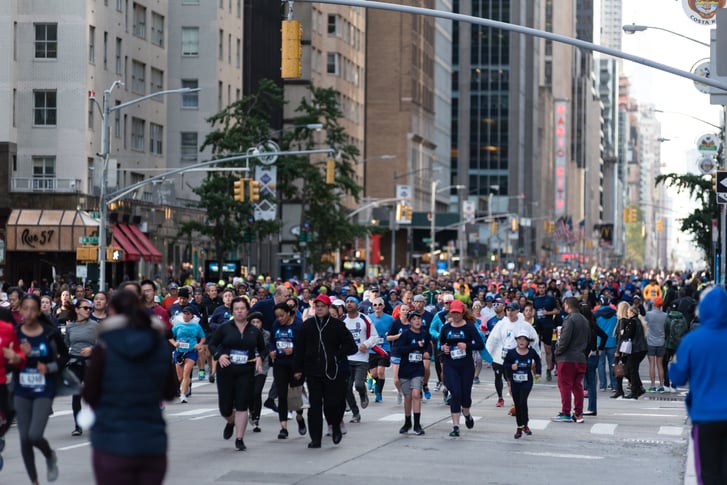 Runners on Sixth Avenue in Manhattan at the Abbott Dash to the Finish Line 5K