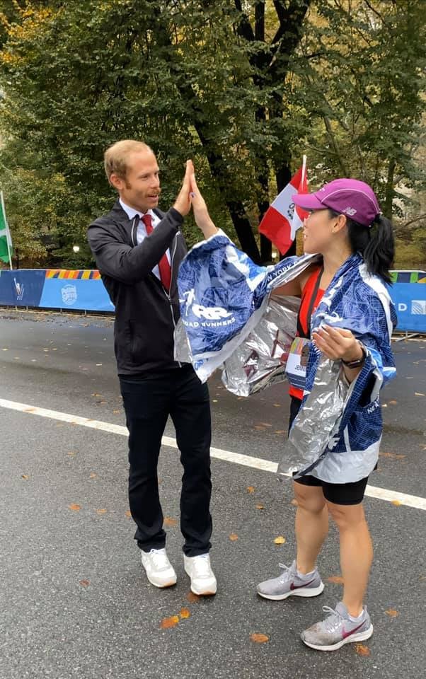 Jennifer Pyun high fiving Jared Ward