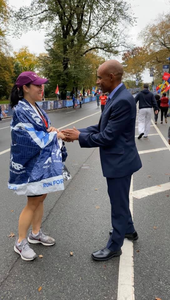 Jennifer Pyun greeted by Meb Keflezighi