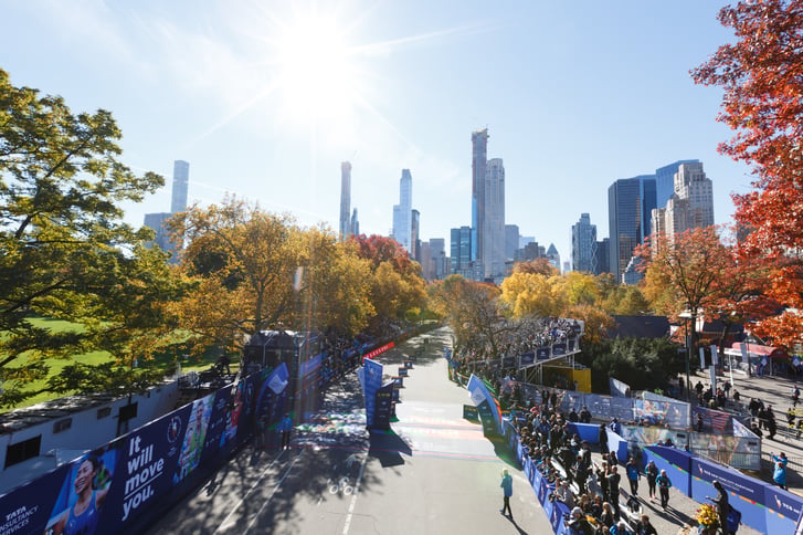 A arial view of the New York City Marathon finish line with the city skyline behind it.