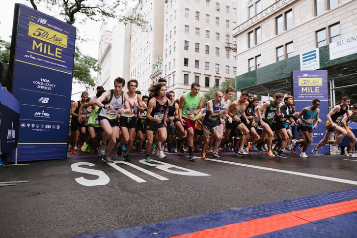 Runners at the start of a men's heat at the New Balance 5th Avenue Mile