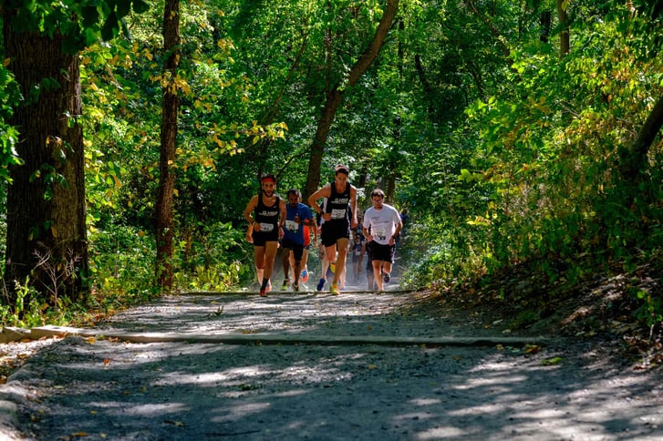A pack of runners in Van Cortlandt Park at the NYRR Harry Murphy Cross Country (5K)