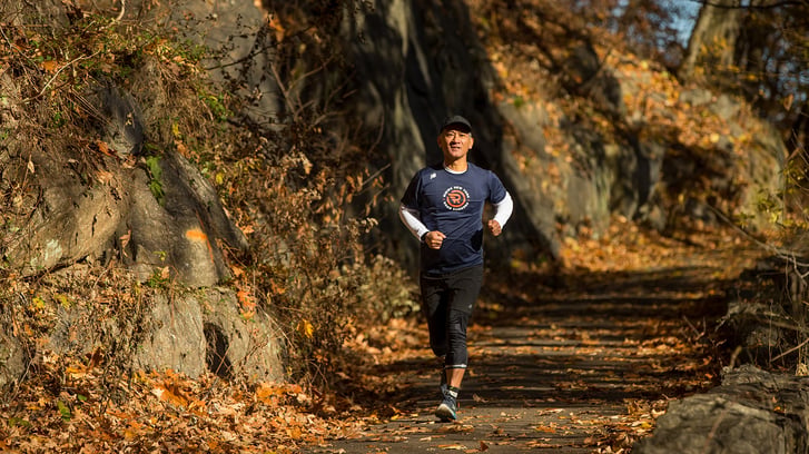 Open Run runner in Inwood Hill Park