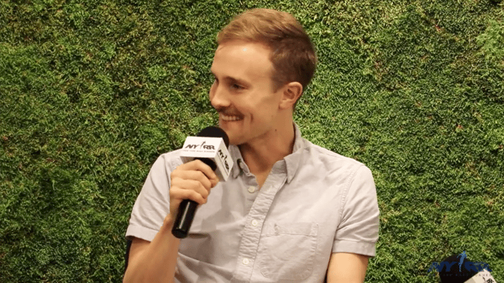 A live recording of the podcast Runners of NYC at the NYRR Run Center with local runner Brendan Martin in frame
