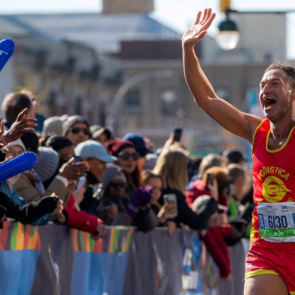 Runner and spectators at 2019 TCS New York City Marathon