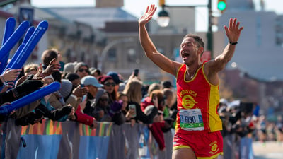Runner and spectators at 2019 TCS New York City Marathon