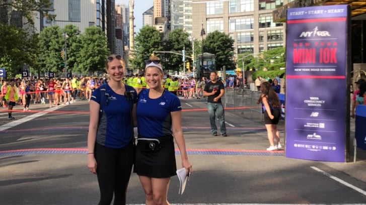 NYRR staffer Jacki at the finish line of the Mini 10K