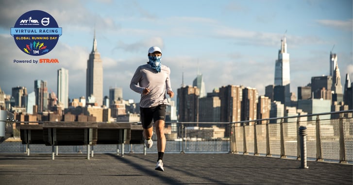 A man running against the NYC skyline.