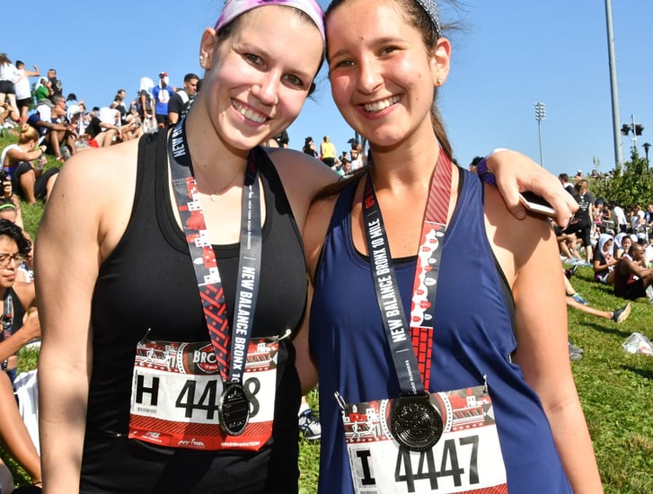 Bronx 10 Mile finishers with their medals