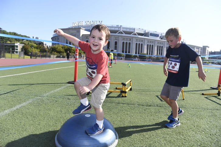 A child on a balance ball at Macomb Park