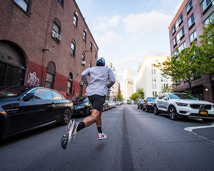 Socially distanced runner in Williamsburg Brooklyn