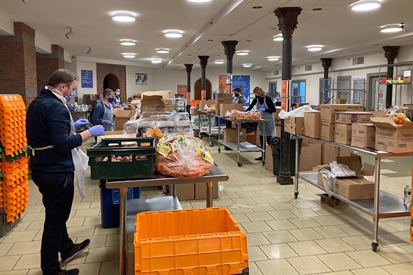 West Side Campaign Against Hunger volunteers packaging produce