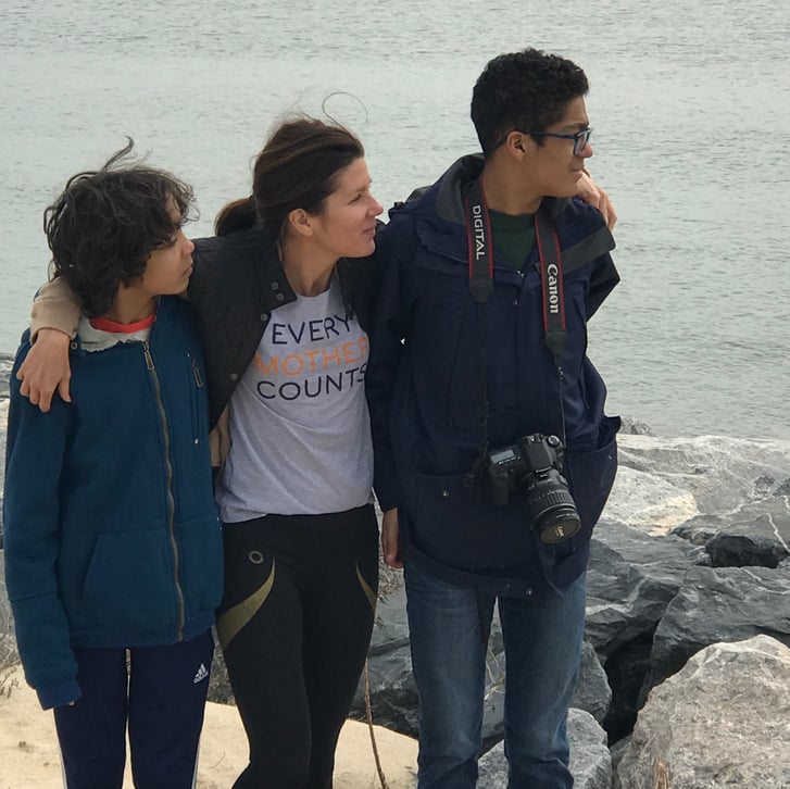 NYRR staffer with family by water