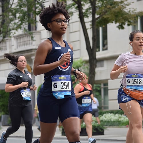 NYRR staffer in New Balance 5th Ave Mile