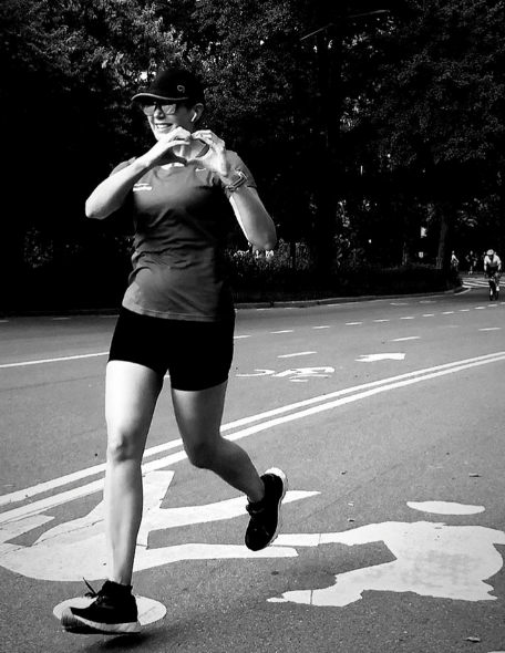 NYRR staff member running