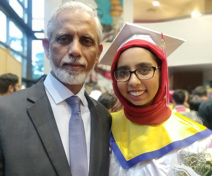 Warisha Siddiqui and father at her high school graduation