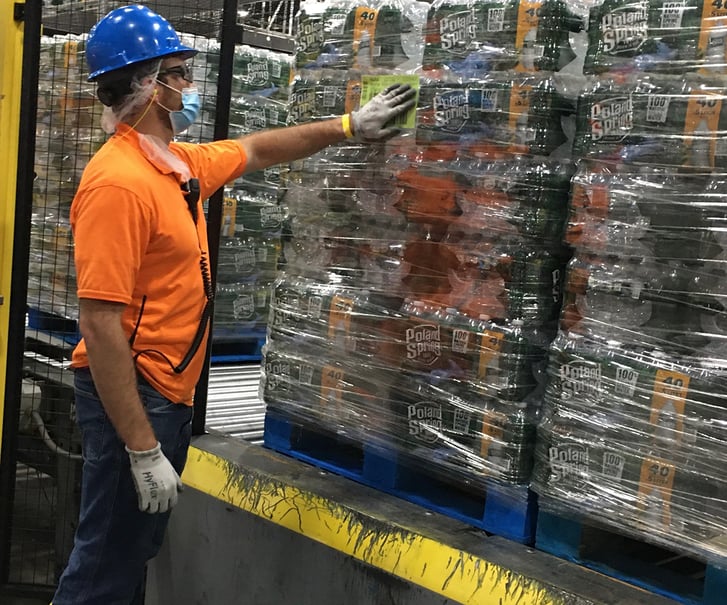 Kelton Miller working at Poland Spring