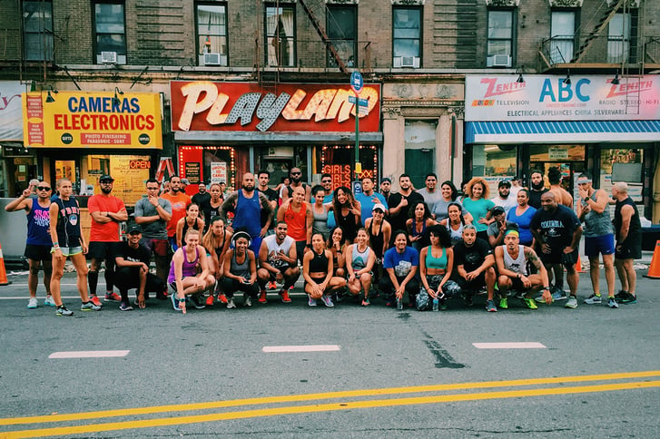 We Run Uptown Crew group photo on street uptown