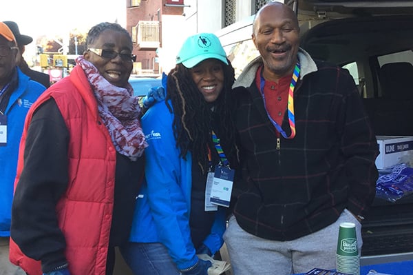 Beverly Shider and 2 other volunteers at TCS New York City Marathon