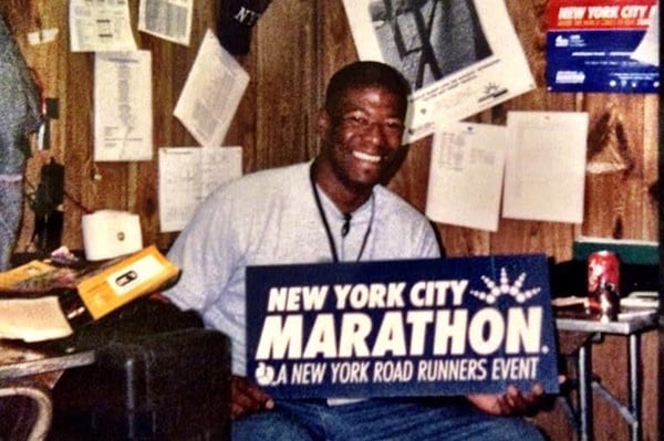 Ted Metellus in an office at 2001 New York City Marathon