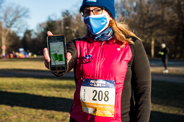 Founders 3.3M runner showing green flag on phone