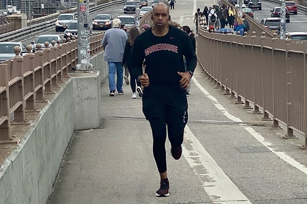 Calvin Harris running on Brooklyn Bridge