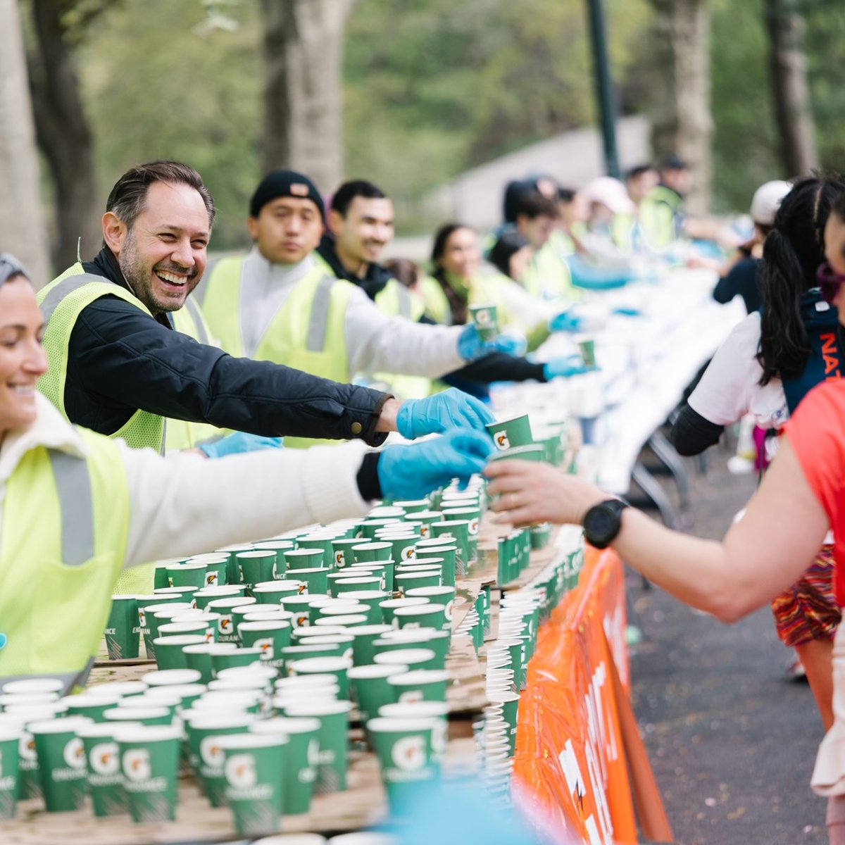 Runners cross the finish line at the Maybelline Women's Half in Central Park