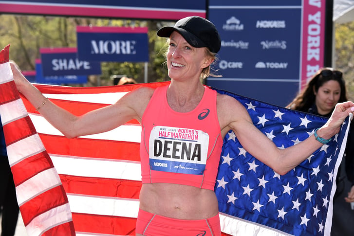Deena Kastor celebrates with the American flag