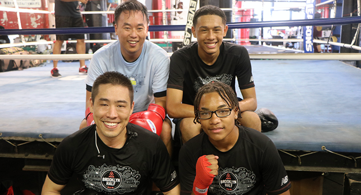 A local gym receiving NYRR race T-shirts through NYRR's clothing donation program