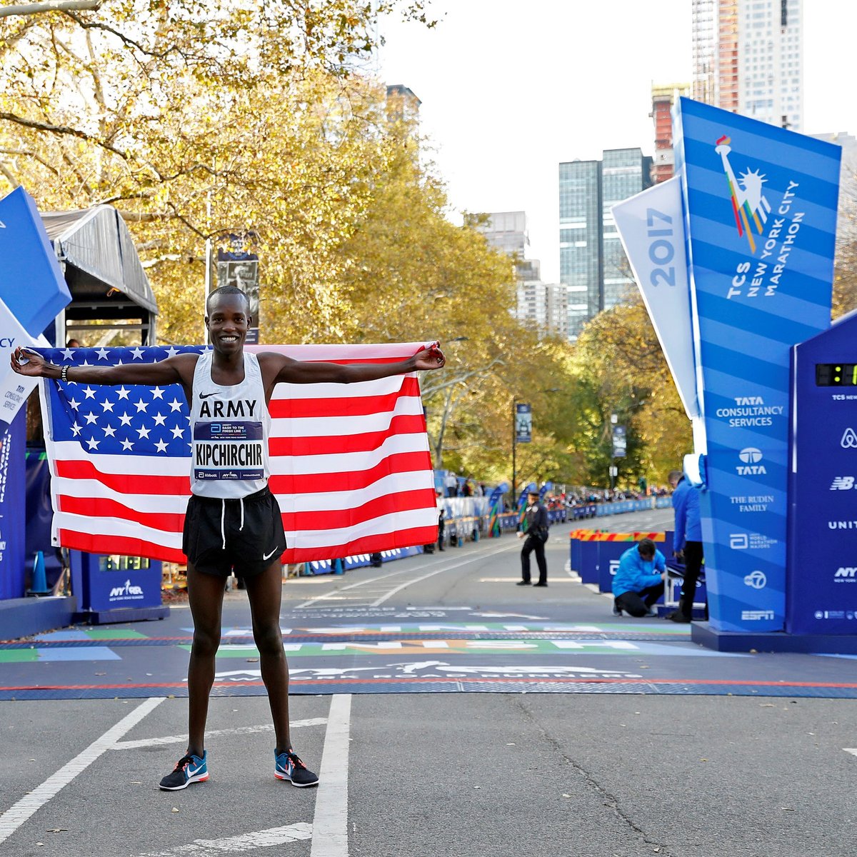 Men's winner of the Dash to the Finish with a flag