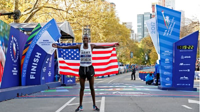 Men's winner of the Dash to the Finish with a flag