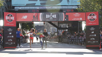 Beverly Ramos crossing the finish line.