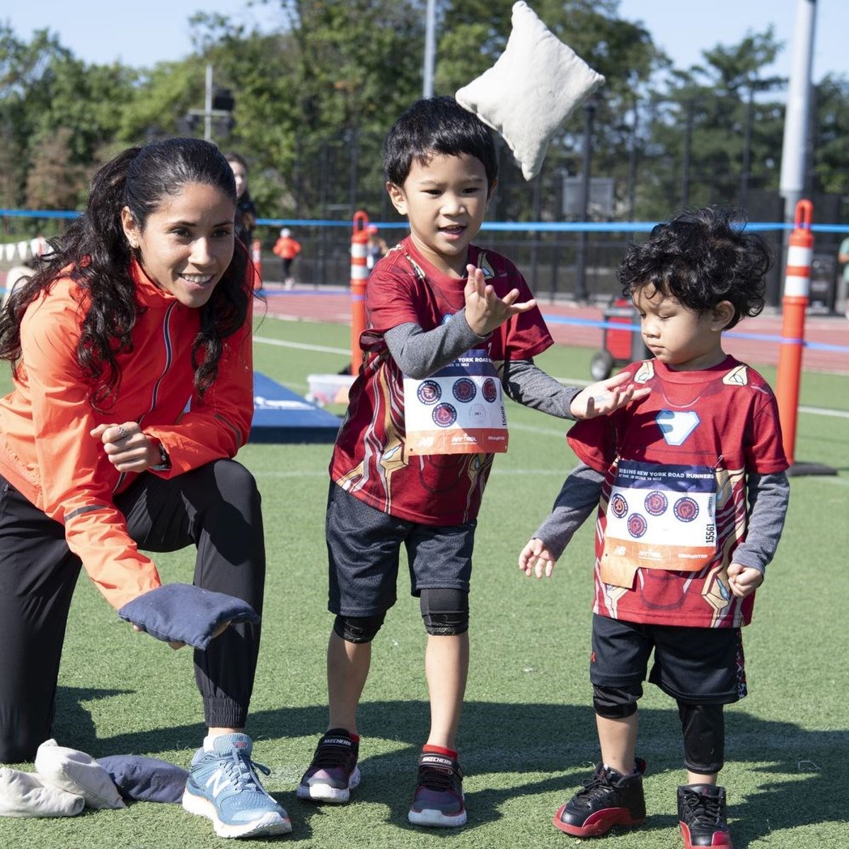 Youth runner playing field games with a Beverly Ramos