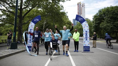 TCS New York City Marathon champions Kathrine Switzer, Tatyana McFadden and Meb Keflezighi, joined by NYRR Staff, break the tape at the TCS New York City Marathon pop-up finish line, to finish to their NYRR Virtual Global Running Day 1M.