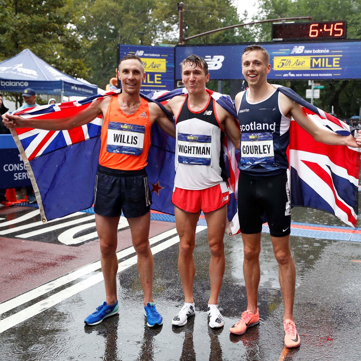 Men's 2018 New Balance 5th Avenue Mile top-three finishers (L-R): Nick Willis, 2nd; Jake Wightman, 1st; Neil Gourley, 3rd