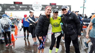 NYRR Team for Kids Ambassador Sam Ryan finishes the 2018 Popular Brooklyn Half