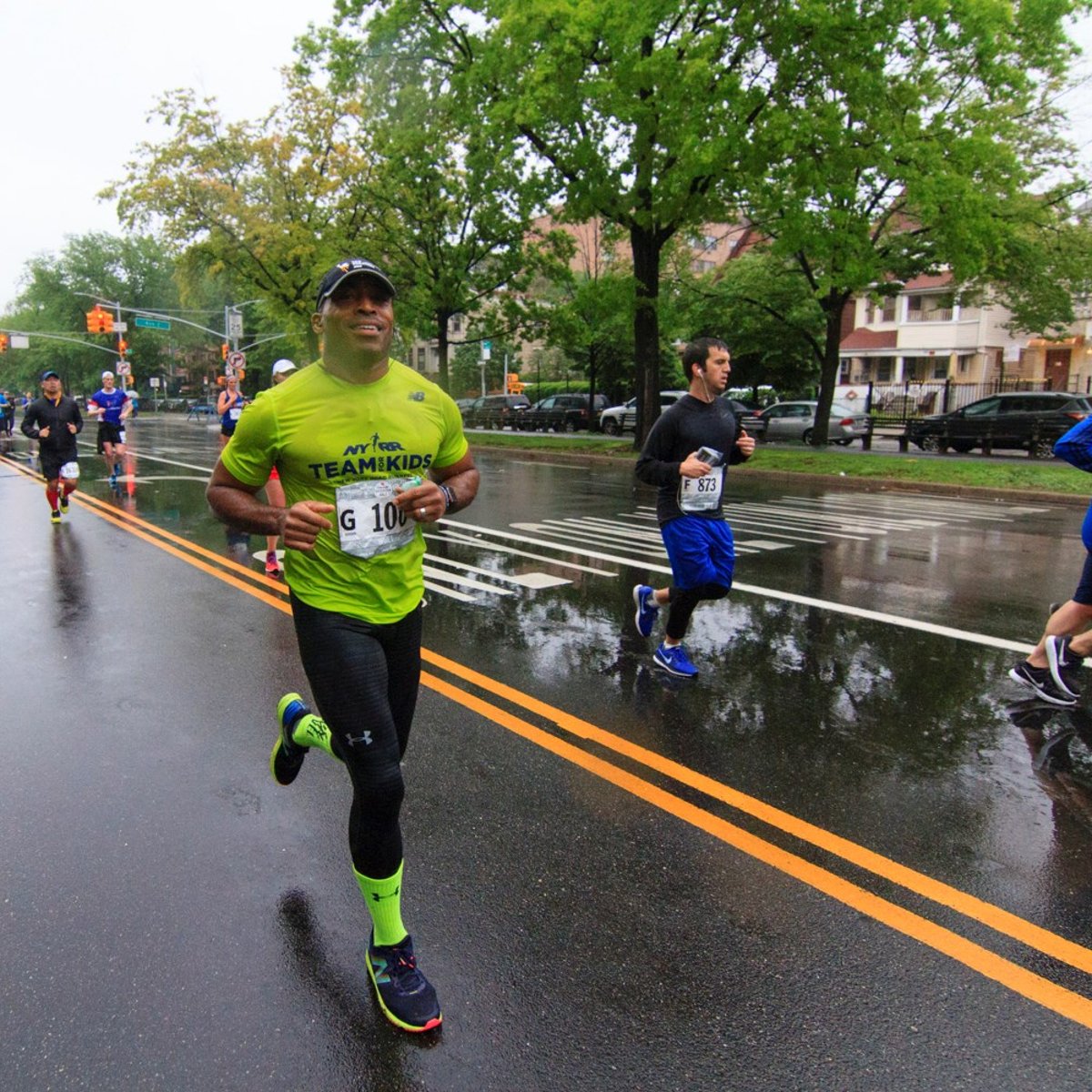 NYRR Team for Kids Ambassador Tiki Barber runs the 2018 Popular Brooklyn Half