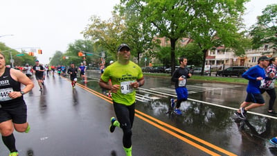 NYRR Team for Kids Ambassador Tiki Barber runs the 2018 Popular Brooklyn Half