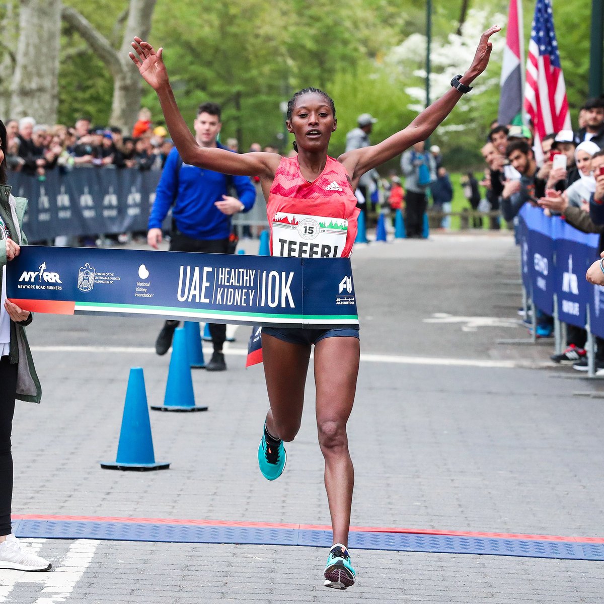 Women's first place finisher Senbere Teferi crosses the finish line.