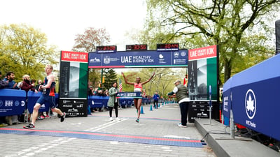 Women's first place finisher Senbere Teferi crosses the finish line.