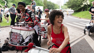 A group of drummers perform on the sidelines of the RBC Brooklyn Half