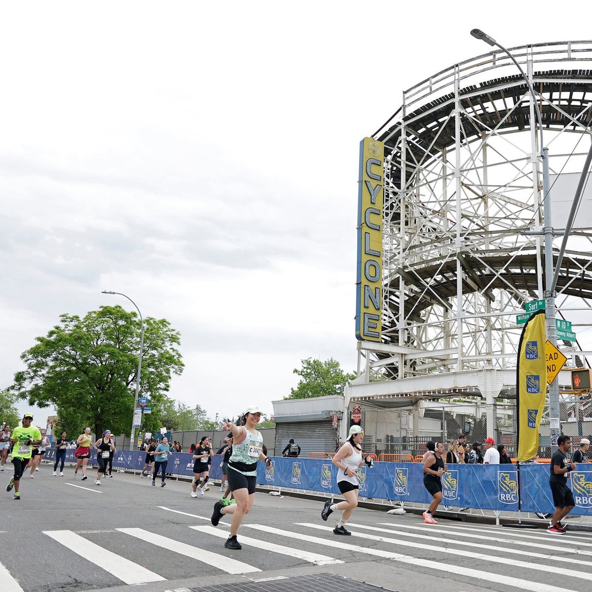 Runners run past the cyclone at the RBC Brooklyn Half