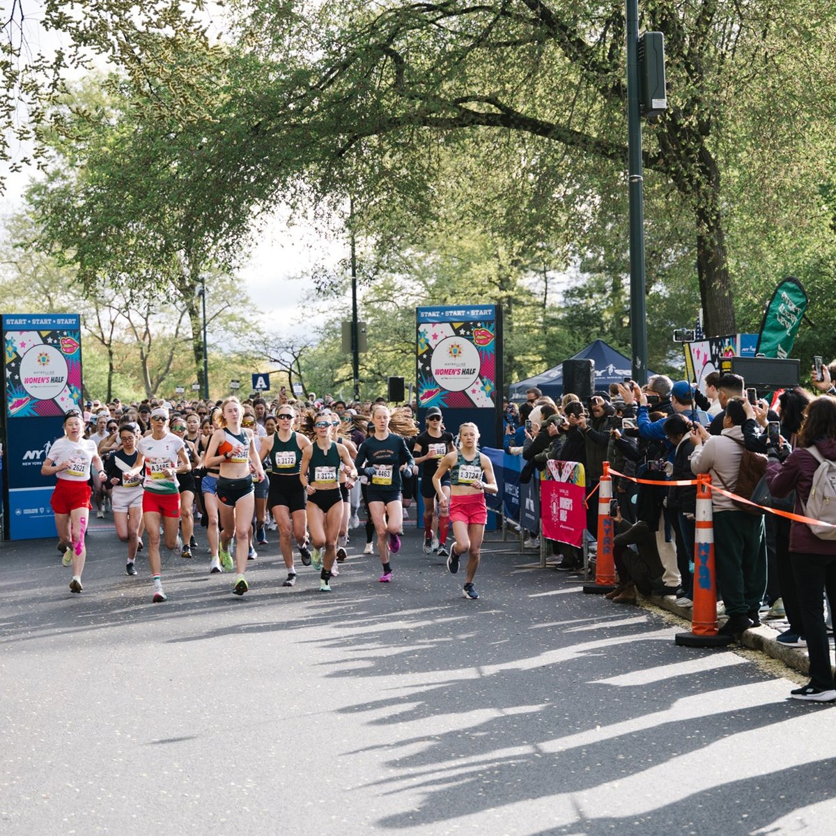 Runners at the Maybelline Women's Half start line
