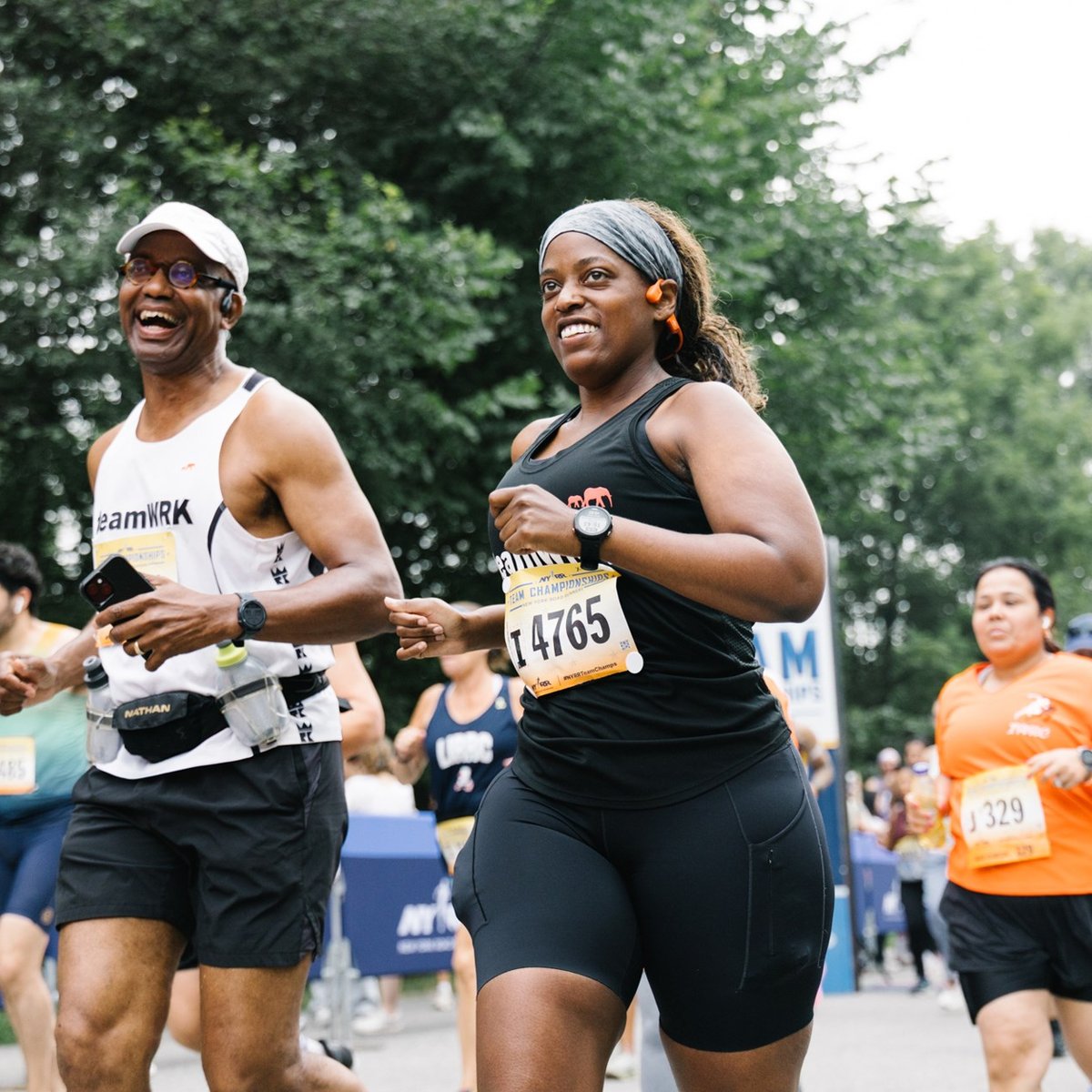 Close up of two runners smiling