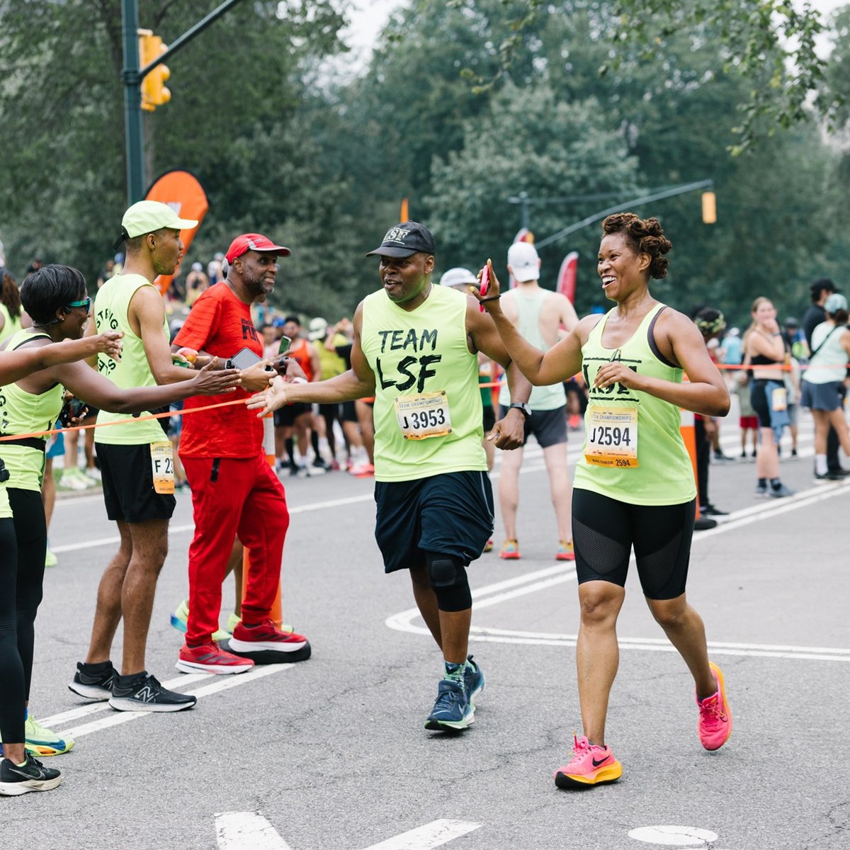 Team Champs participants high-fiving