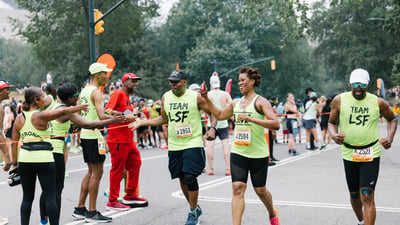 Team Champs participants high-fiving