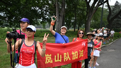Group shot with sign