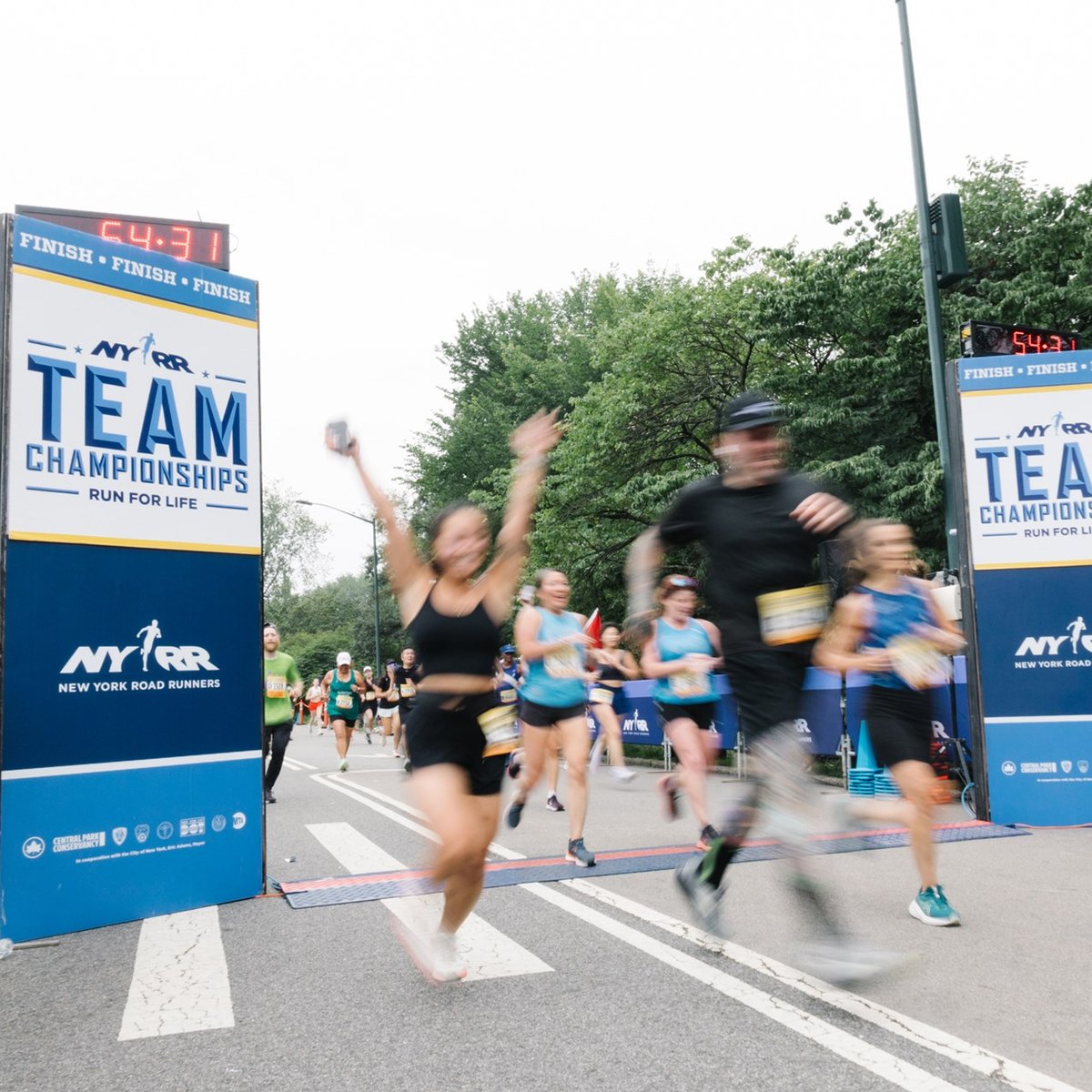 Team Champs blurry participants finishing