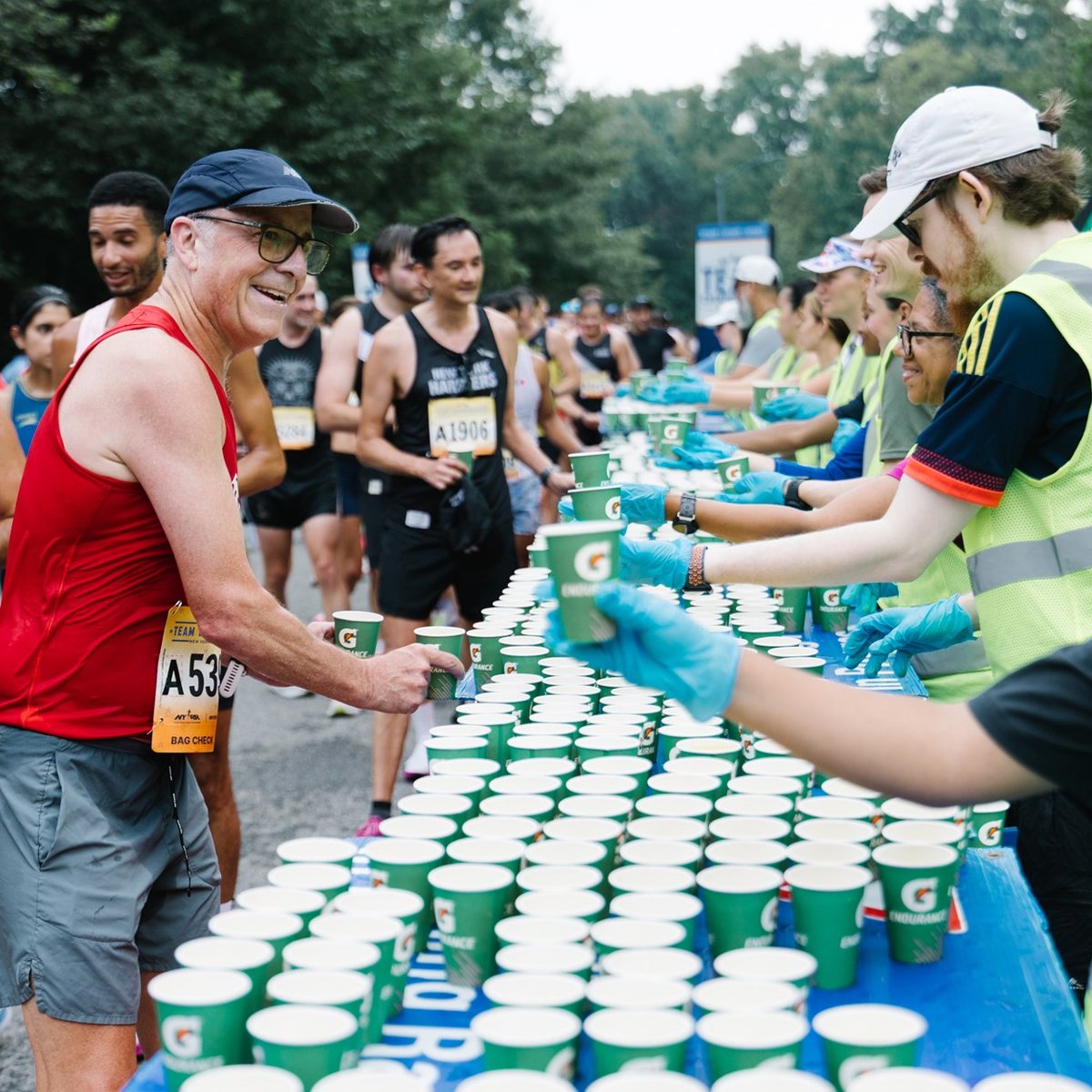 Team Champs participant grabbing water