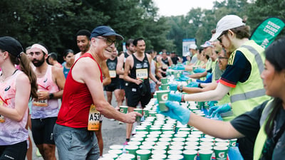Team Champs participant grabbing water